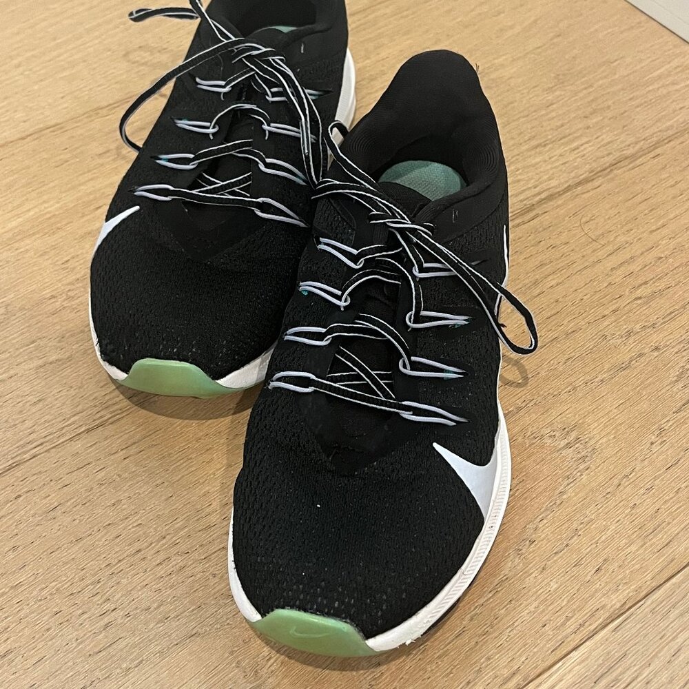 Black Nike running shoes